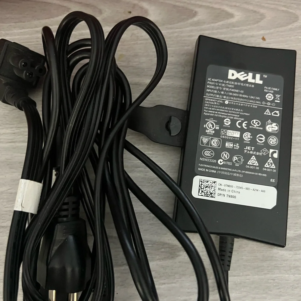 Dell charger for model FA 65 NE1-00.